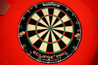 Johnny Clayton Leads Premier League Standings Ahead of Crucial Quarter-Final