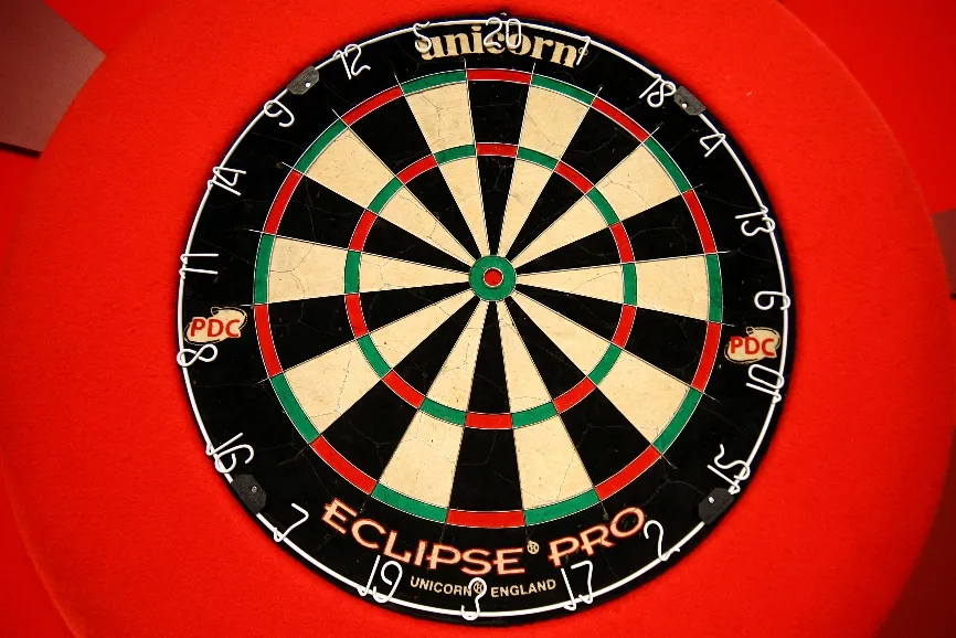 Johnny Clayton Leads Premier League Standings Ahead of Crucial Quarter-Final