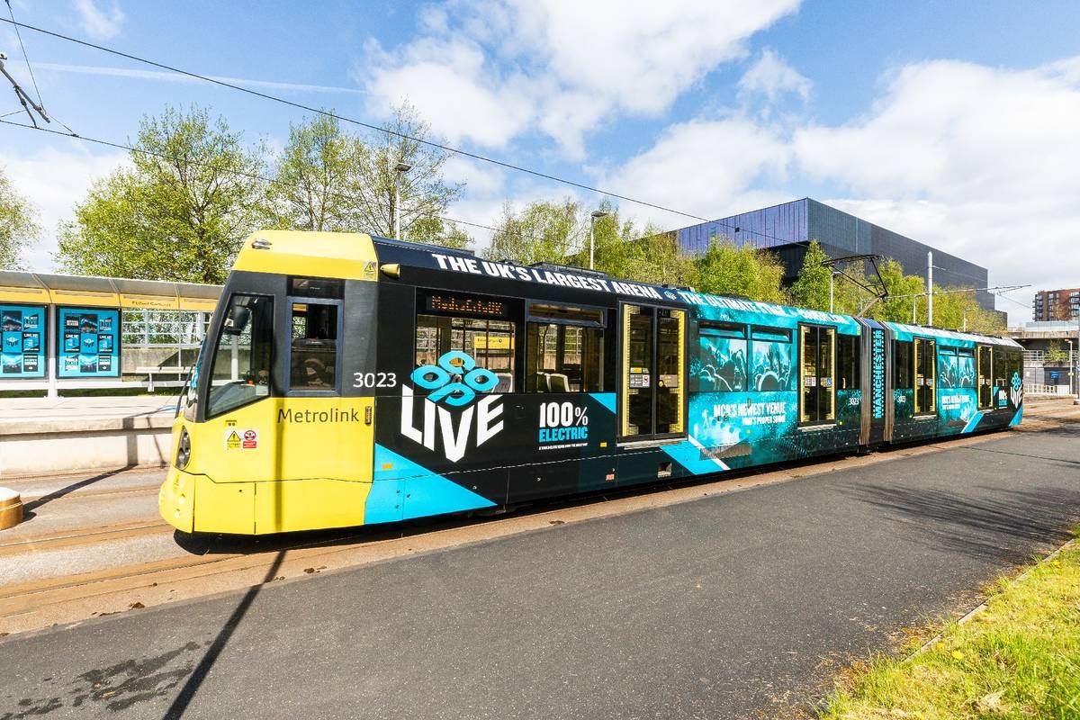 Metrolink tram with Co-op Live wrap