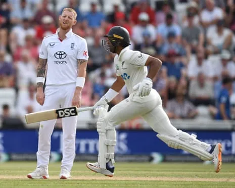 Rachin Ravindra runs past Ben Stokes