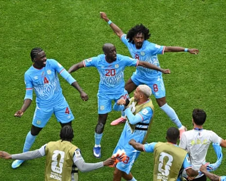 Yoane Wissa (No 20) celebrates after his equaliser – the DRC’s first ever World Cup finals goal.