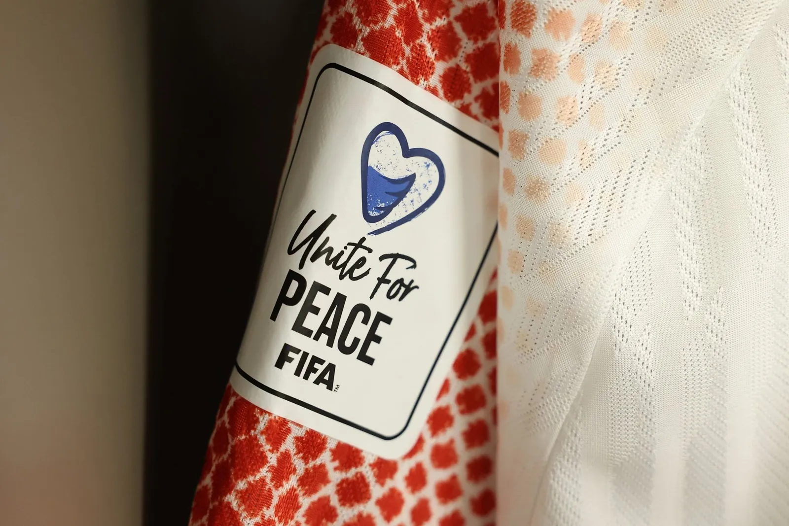 SANTA CLARA, CALIFORNIA - JUNE 16: Detail of the Unite For Peace patch on a shirt in the Jordan dressing room before the FIFA World Cup 2026 Group J match between Austria and Jordan at San Francisco Bay Area Stadium on June 16, 2026 in Santa Clara, California. (Photo by Matt McNulty - FIFA/FIFA via Getty Images)