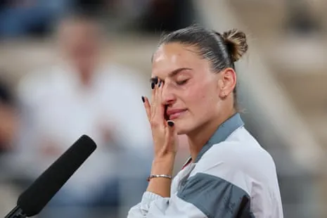 Marta Kostyuk wipes away tears after beating Elina Svitolina