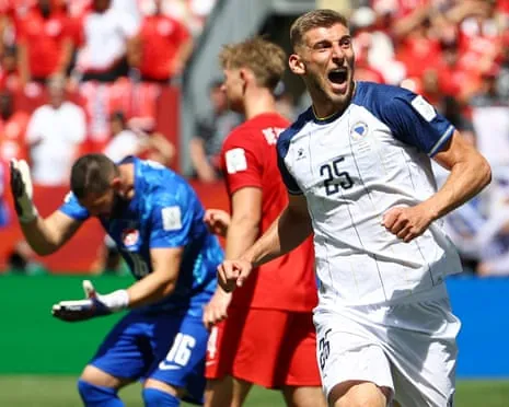 Bosnia and Herzegovina's Jovo Lukic celebrates opening the scoring.