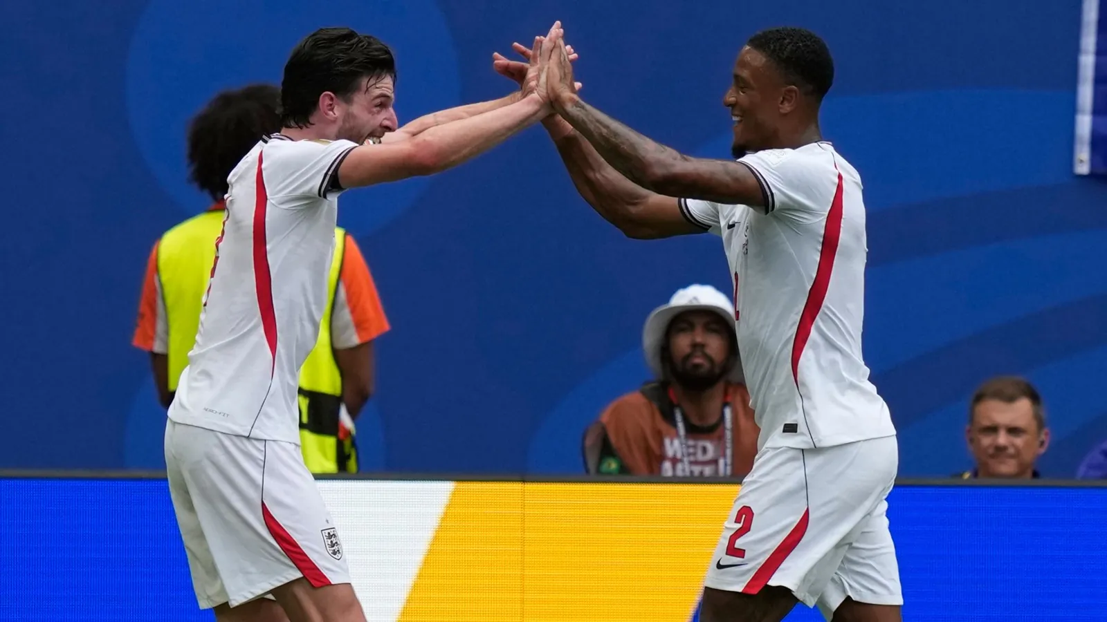 England's Ezri Konsa, right, is congratulated by Declan Rice after scoring his side's second goal