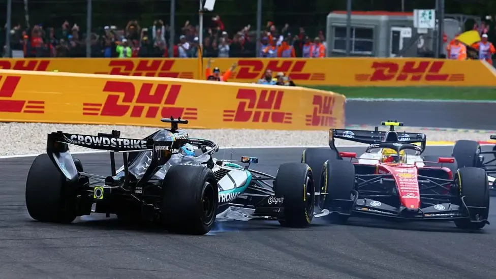 George Russell and Lewis Hamilton collide on the opening lap in Belgium